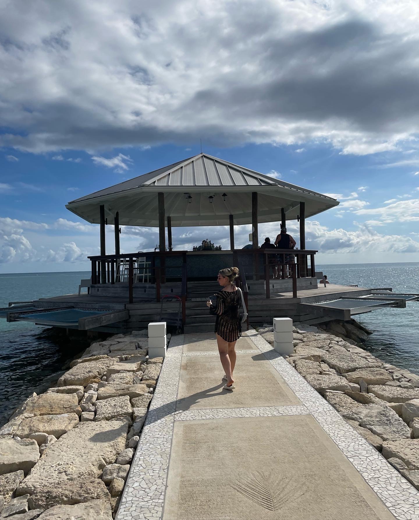 Jen walking to Latitudes