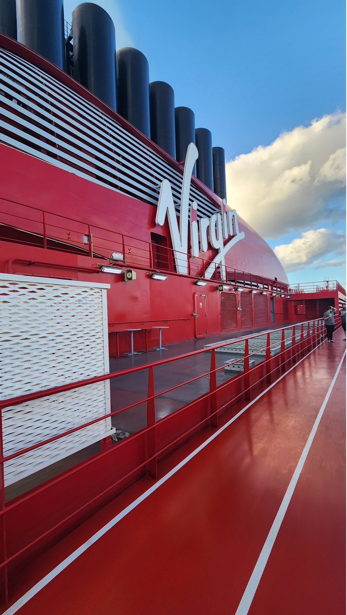 Virgin Voyages Scarlet Lady ship sign exterior, view from the red running track